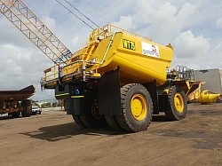 Komatsu HD785 tank with rear platform